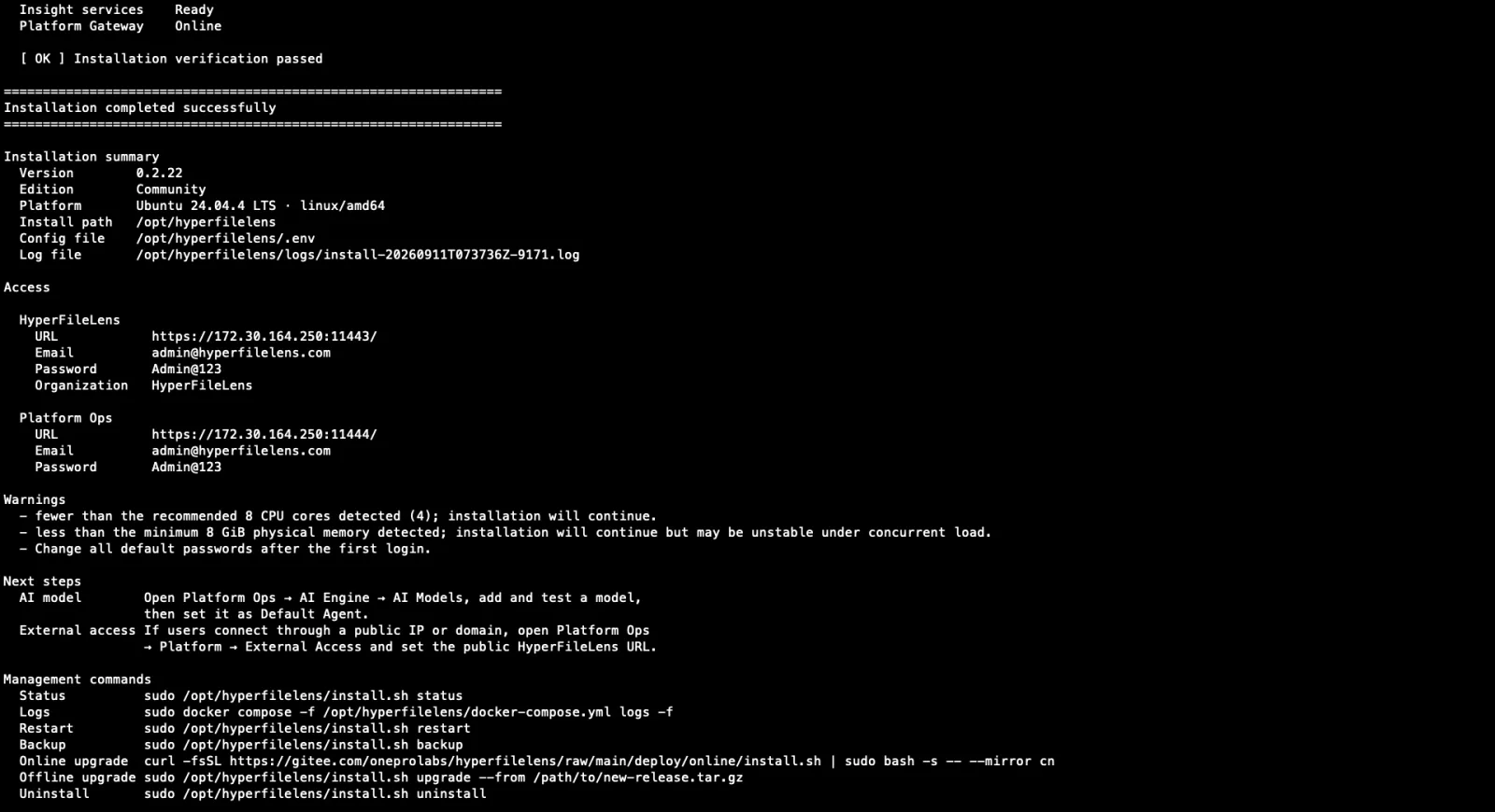 安装脚本执行完成的终端输出，展示 HyperFileLens 和 Platform Ops 两个访问地址以及初始邮箱密码